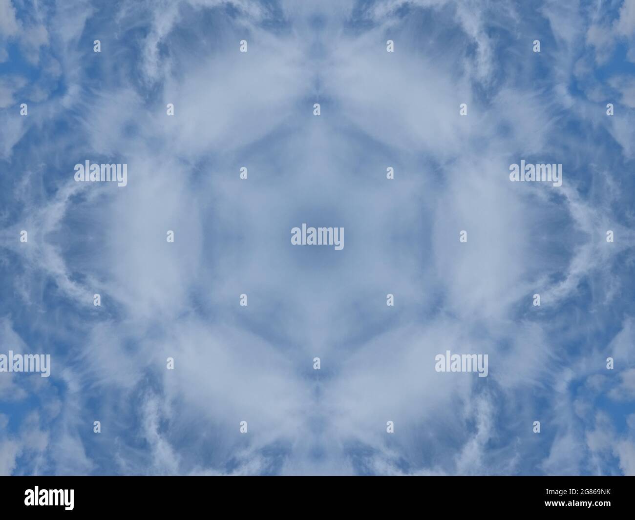 Kaleidoscopic abstract clouds in the blue sky background Stock Photo
