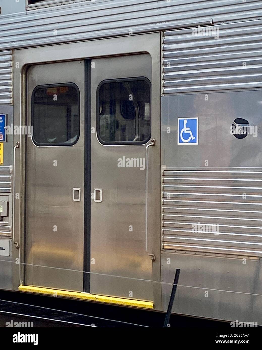 Handicap accessible entrance on Metra commuter rail train car Stock Photo