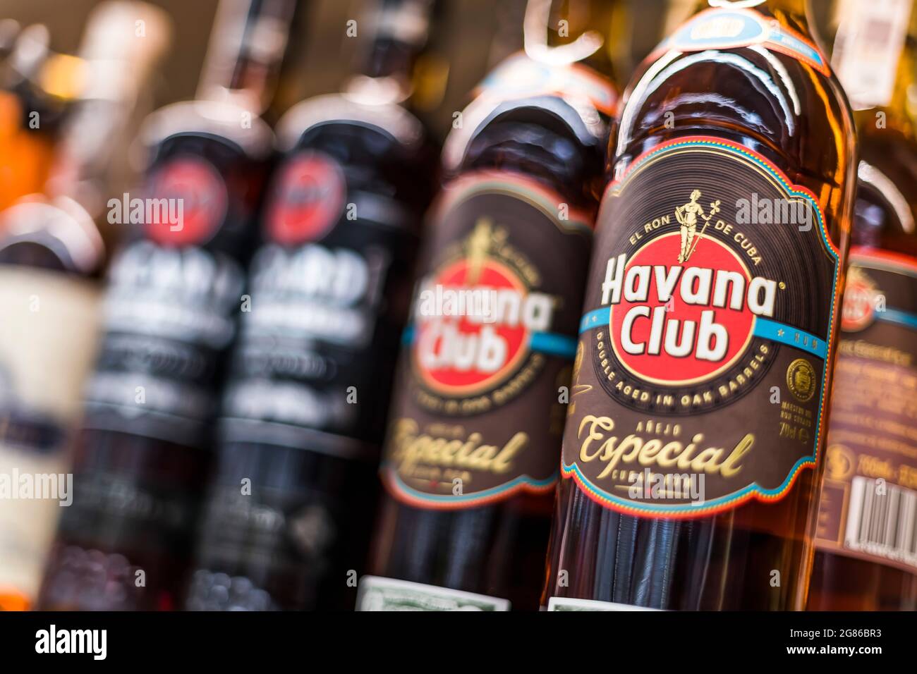 POZNAN, POL JUN 17, 2021 Bottles of Havana Club and Bacardi rum put
