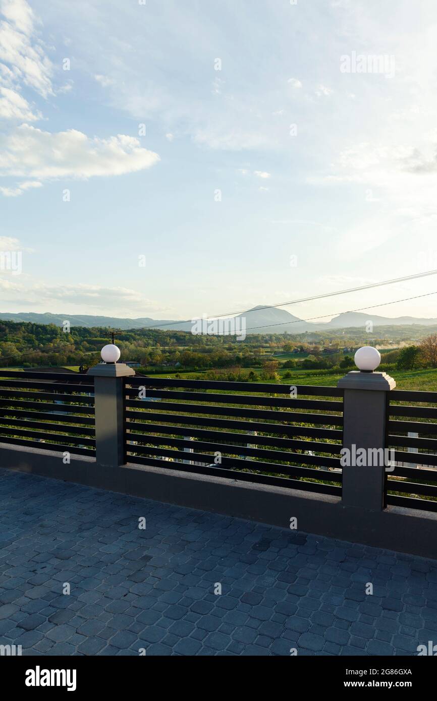 balcony in the countryside, sunset view Stock Photo