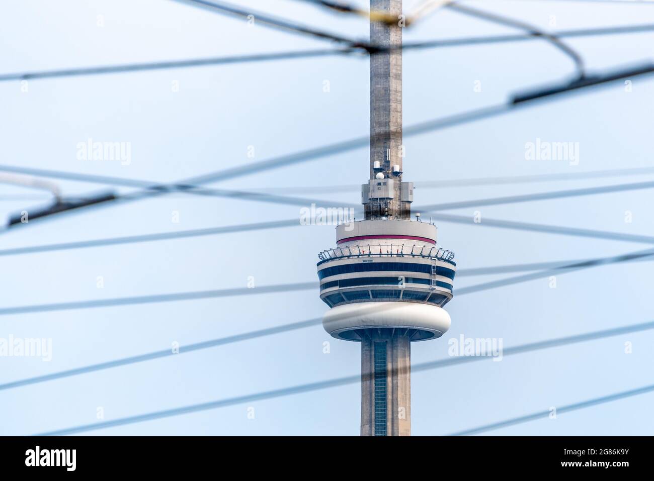 CN tower framed in streetcar cables, toronto, canada Stock Photo