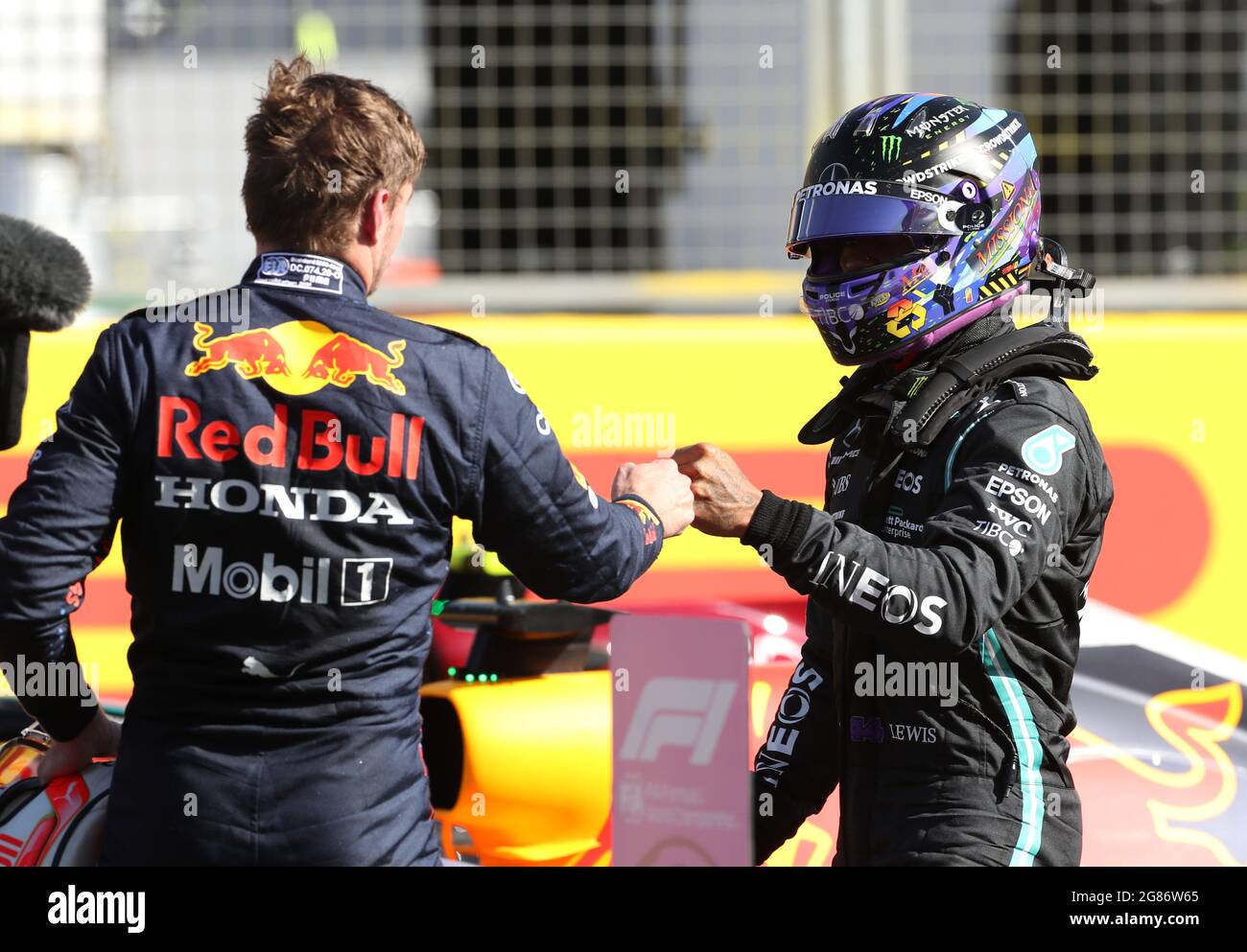 Mercedes' Lewis Hamilton (right) and Red Bull Racing's Max Verstappen bump  fists after the sprint race of the British Grand Prix at Silverstone,  Towcester. Picture Date: Saturday July 17, 2021 Stock Photo - Alamy