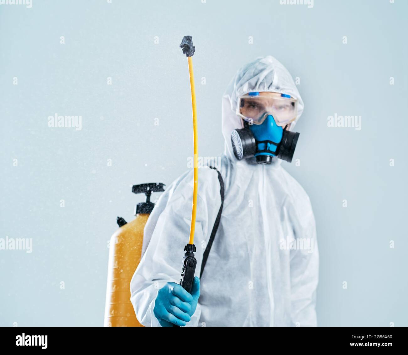 professional disinfector performs the treatment with an antibacterial ...