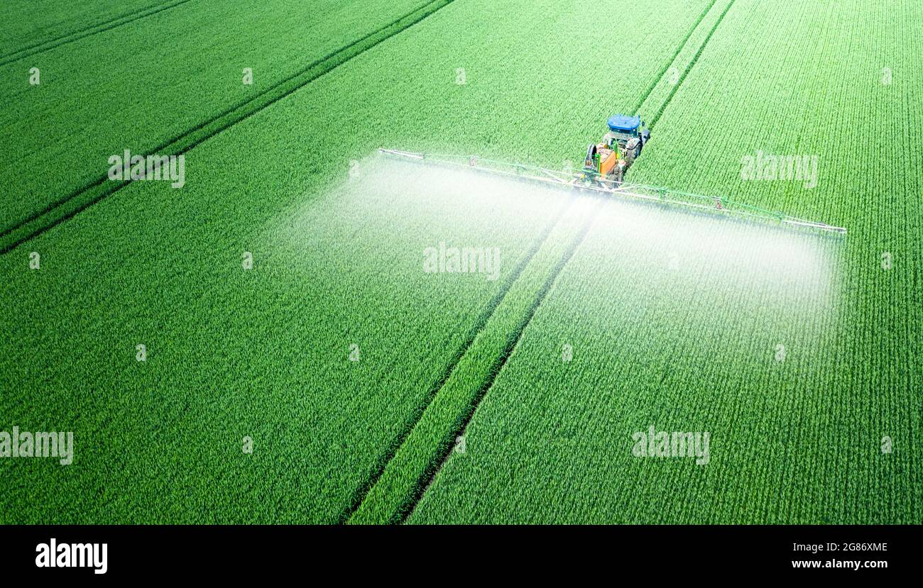 Application of watersoluble fertilizers, pesticides or herbicides in