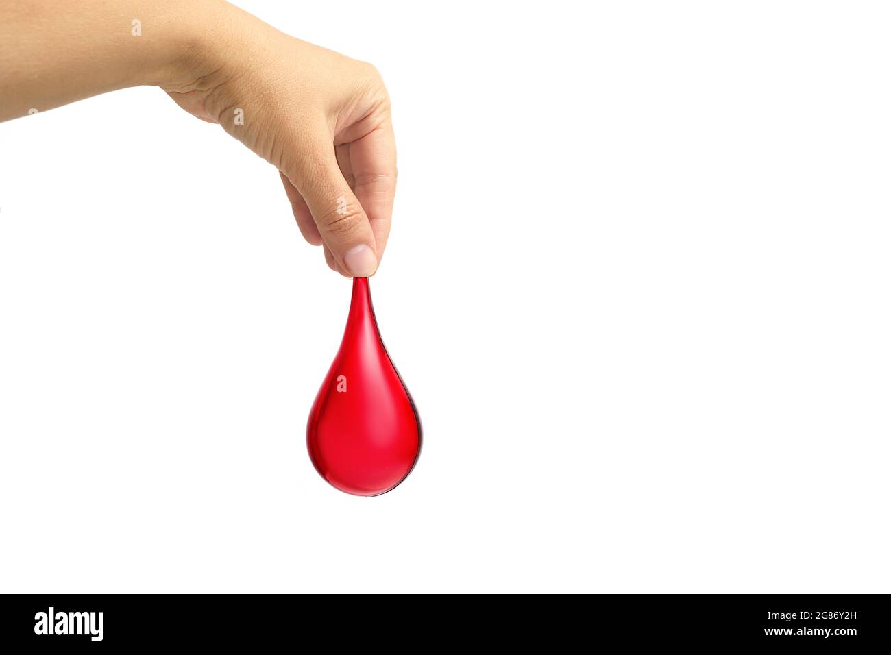 Hand holding blood drop on white background. Blood donation, blood  transfusion, world blood donor day, world hemophilia day Stock Photo - Alamy