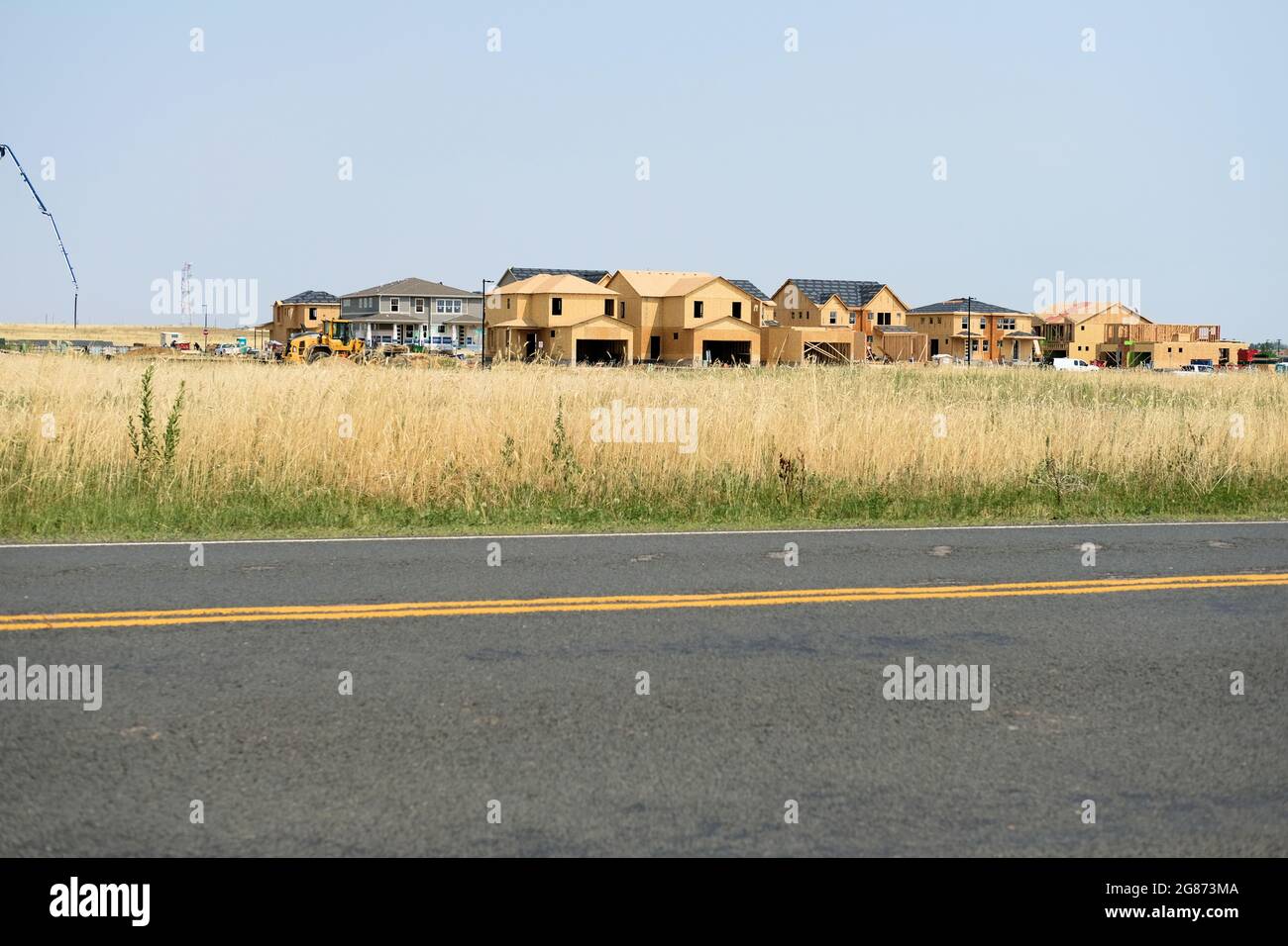 Home building construction site; housing development in Aurora, Colorado; real estate residential home market. Stock Photo