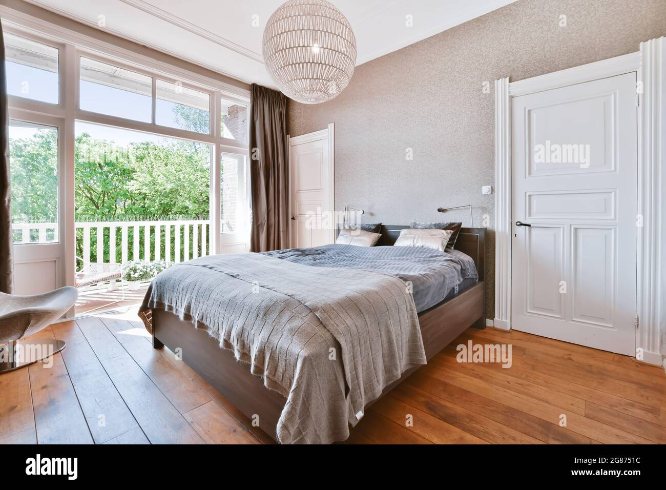 Interior of a cozy and bright bedroom with beautiful decoration Stock ...