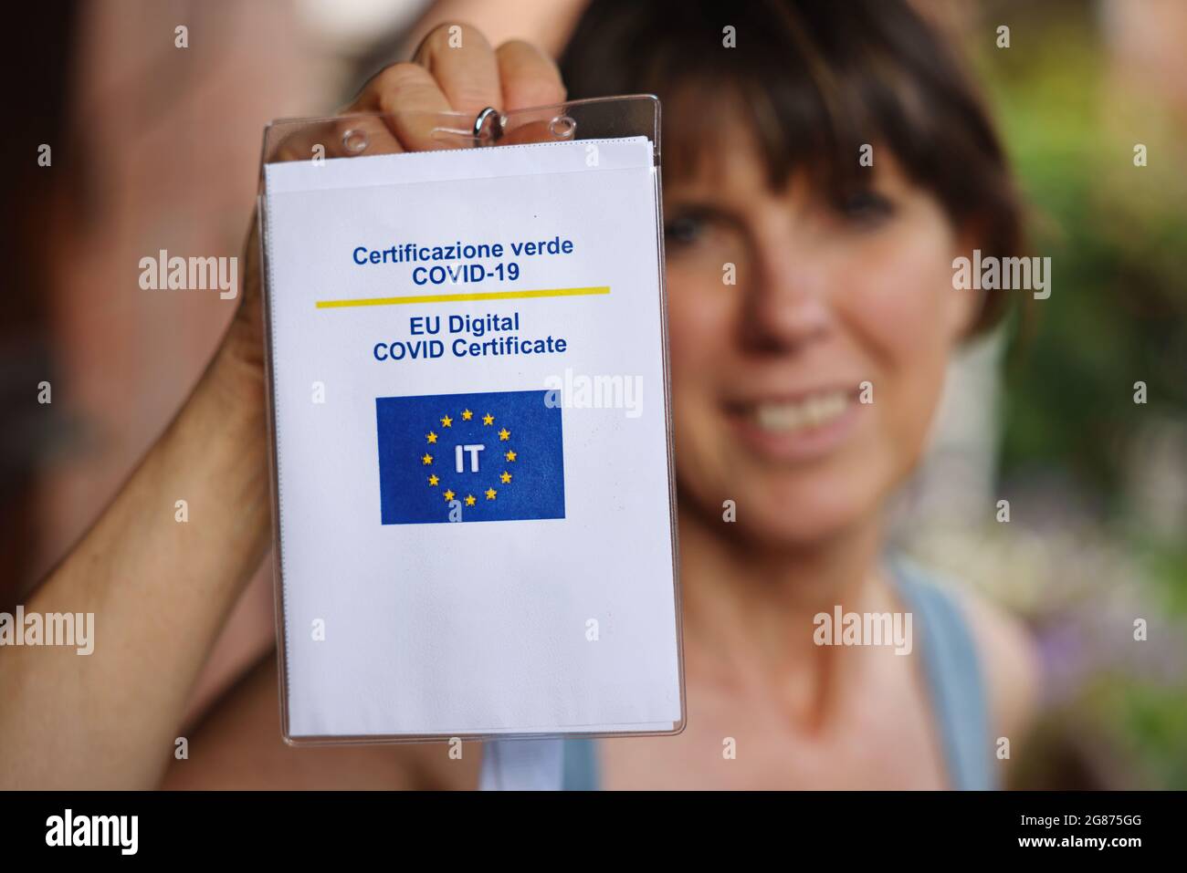 Covid Pass. EU Digital certificate Covid-19. Covid or Coronavirus vaccine certificate, passport. Selective focus. Stock Photo