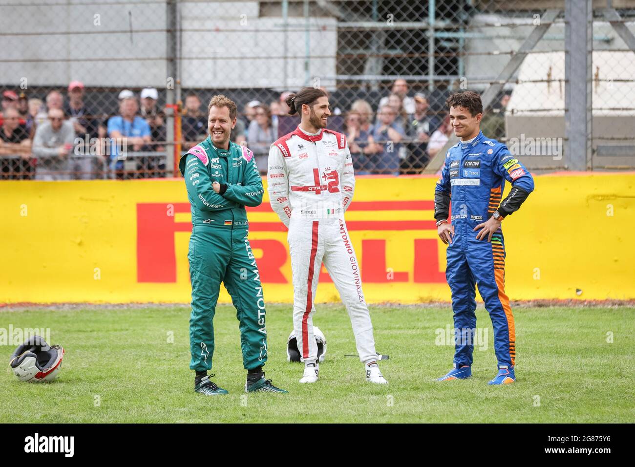 Silverstone, UK. 15th July, 2021. # 5 Sebastian Vettel (GER, Aston Martin  Cognizant F1 Team), # 99 Antonio Giovinazzi (ITA, Alfa Romeo Racing ORLEN),  # 4 Lando Norris (GBR, McLaren F1 Team),