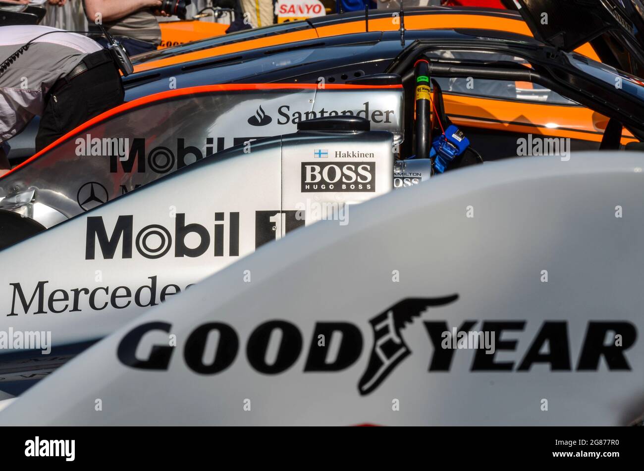 Row of McLaren Formula 1 Grand Prix racing cars at the Goodwood Festival of Speed 2013 to celebrate 50 years of McLaren Racing Limited Stock Photo