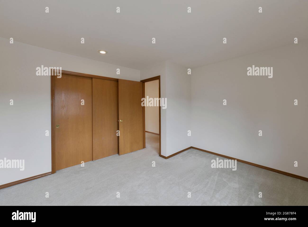Modern residential empty bedroom interior Stock Photo - Alamy