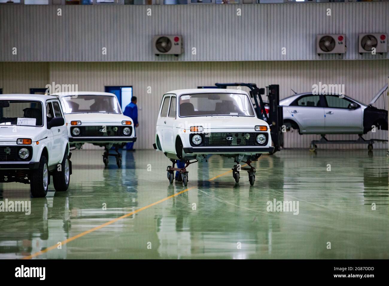 Ust'-Kamenogorsk, Kazakhstan - May 31,2012: Asia-Auto company auto-building plant. Lada VAZ car bodies on dollies. Moving to assembling line. Stock Photo