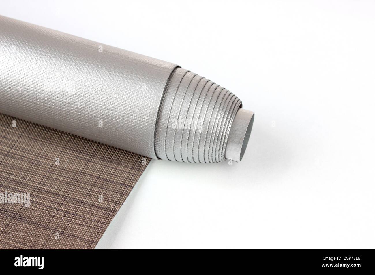 Roller blinds are made from texture material. Color blackout roller blind. Stock Photo
