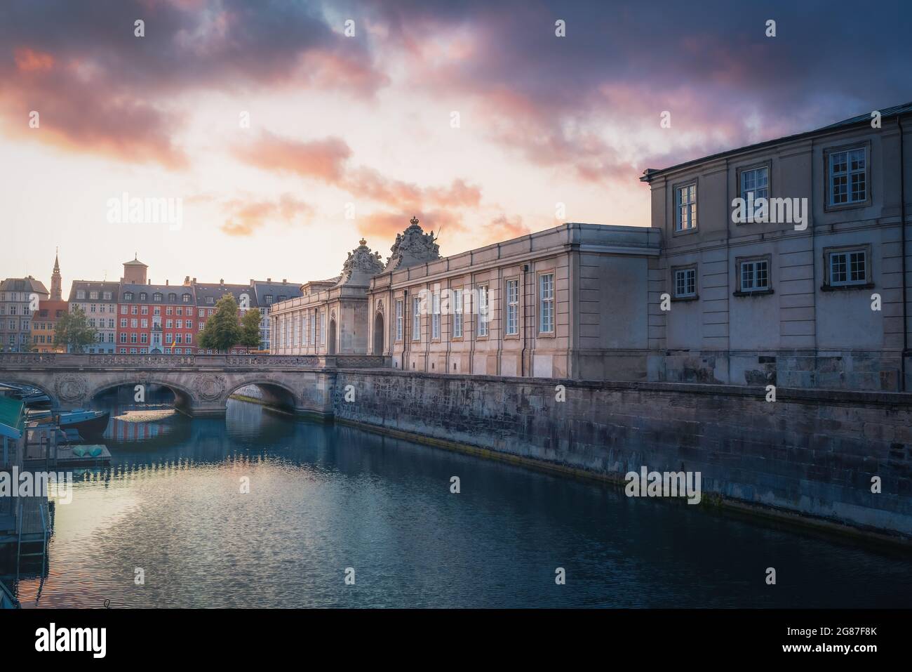 Frederikholms Canal, Marble Bridge and Christiansborg Palace Entrance at sunset - Copenhagen, Denmark Stock Photo