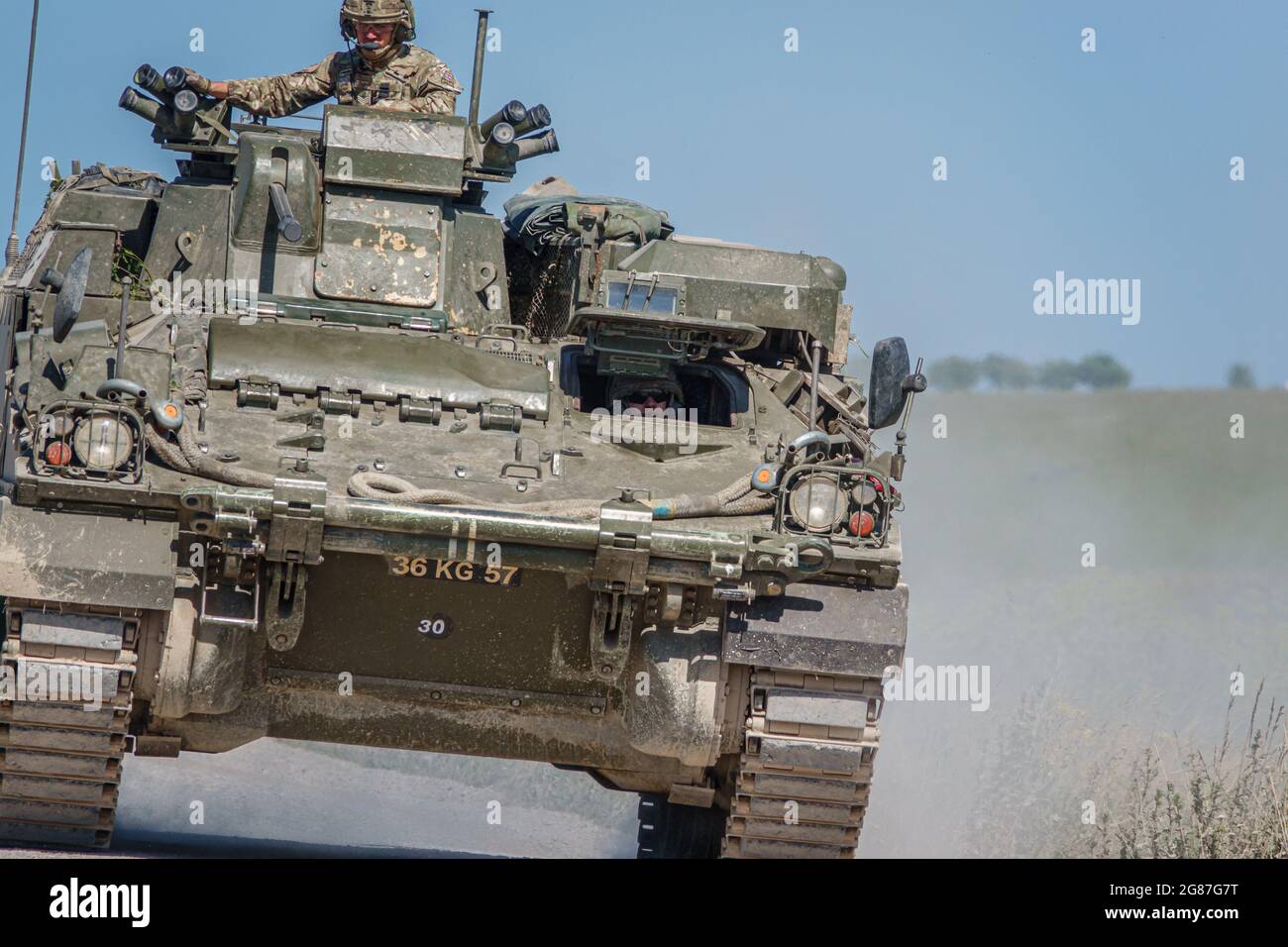 British army Warrior FV512 mechanised recovery vehicle tank in action on military exercise, Salisbury Plain, Wiltshire UK Stock Photo