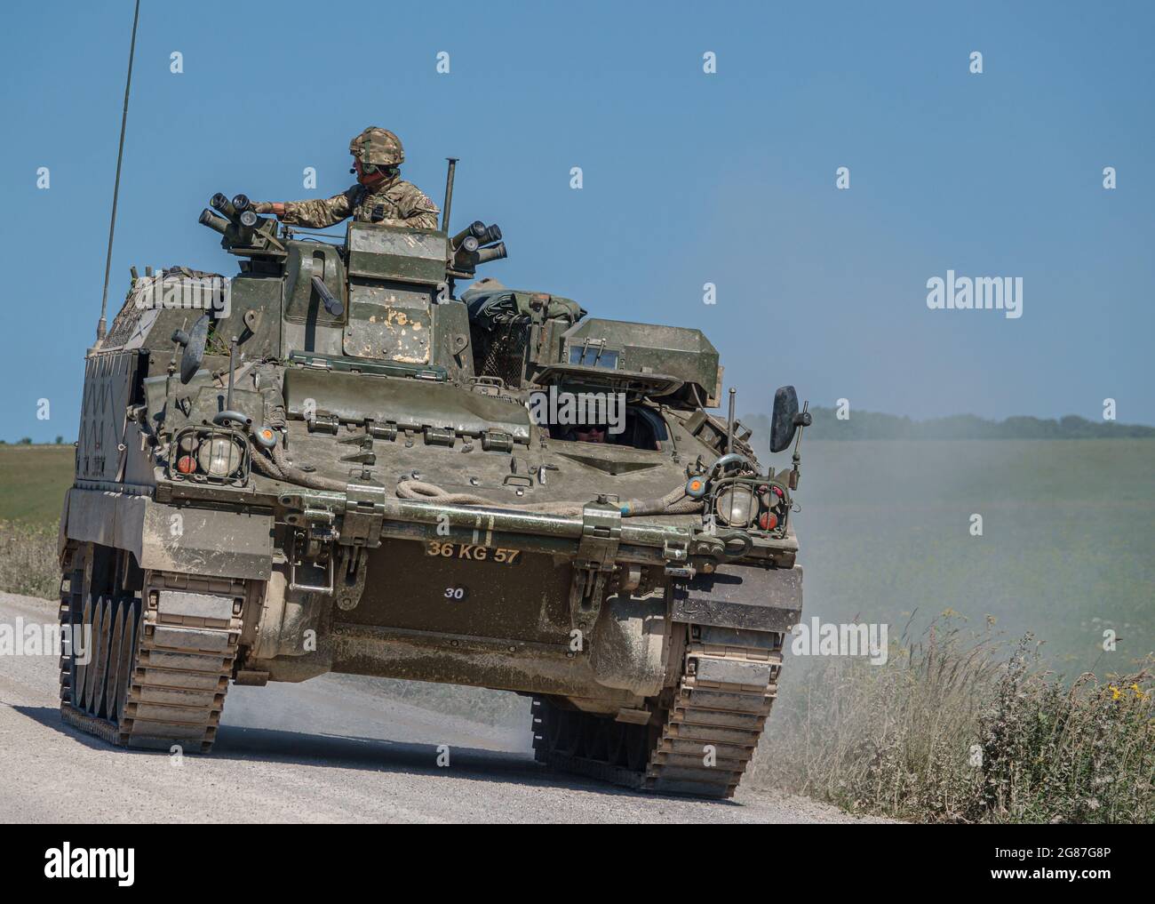 British army Warrior FV512 mechanised recovery vehicle tank in action on military exercise, Salisbury Plain, Wiltshire UK Stock Photo