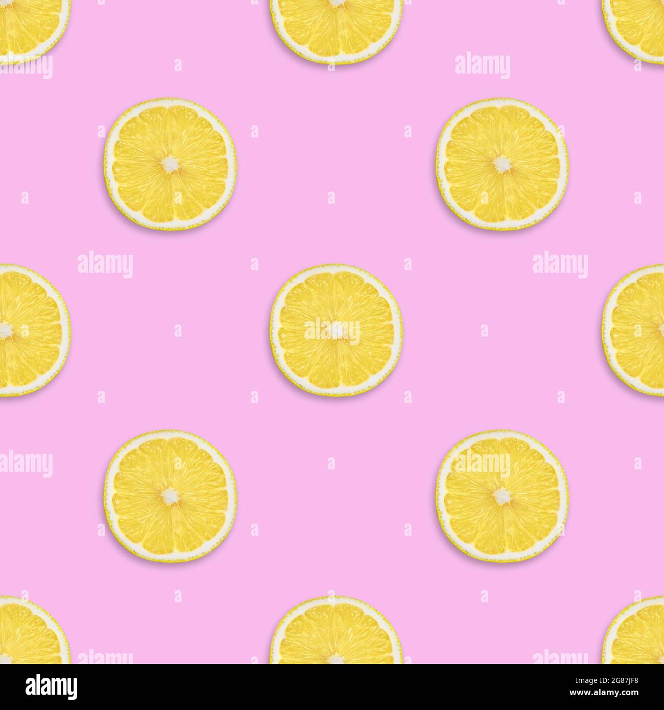 Lemon seamless pattern on a pink background. Tropical fruit seamless ...