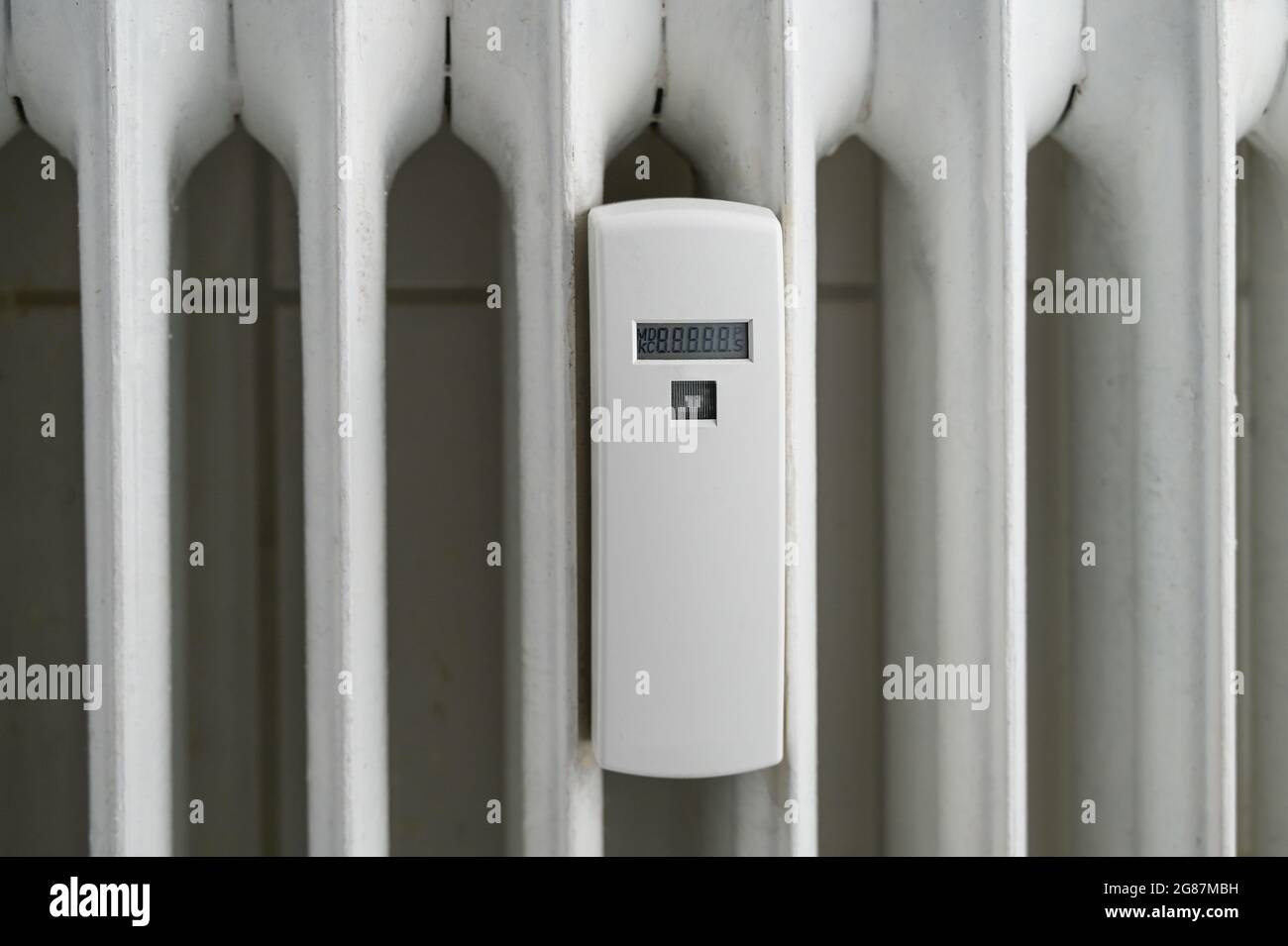 Heat cost allocator device attached to an older radiator to measure the