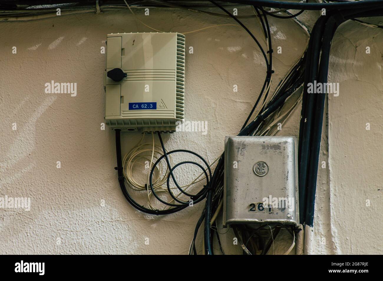 Carmona Spain July 16, 2021 Electric cables on the facade of a building