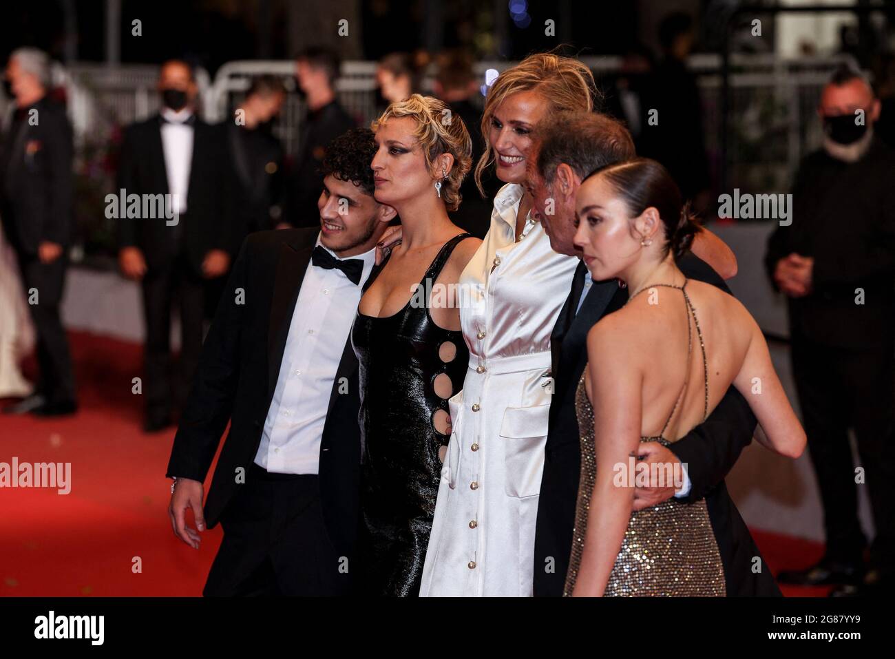 CANNES - JULY 13: Jean-Christophe Reymond, Vincent Lindon, Julia Ducournau,  Agathe Rousselle, Garance Marillier and Lai?s Salameh arrives to the  premiere of " TITANE " during the 74th Cannes Film Festival on