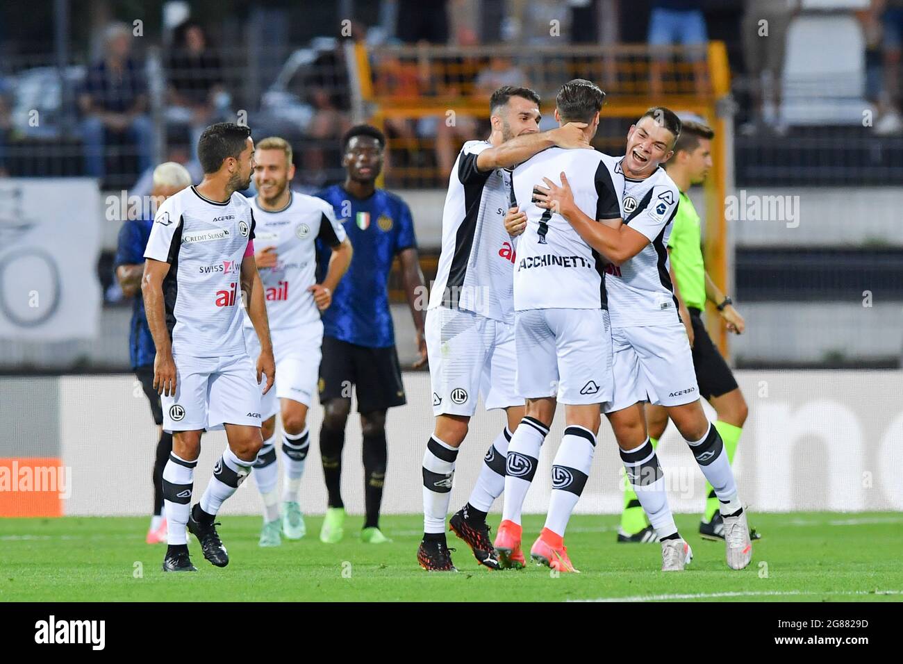 Lugano, Switzerland. 25th July, 2021. Mikael Facchinetti (#7 FC Lugano) and  Nikola Boranijasevic (#19 FC Zuerich) during the Super League match between FC  Lugano and FC Zuerich at Cornaredo Stadium in Lugano