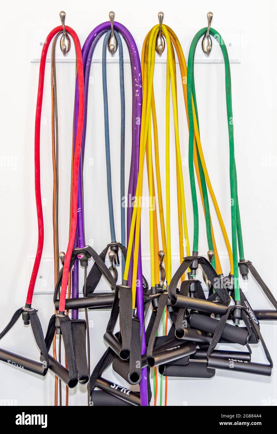 collection of resistance bands at a gym Stock Photo