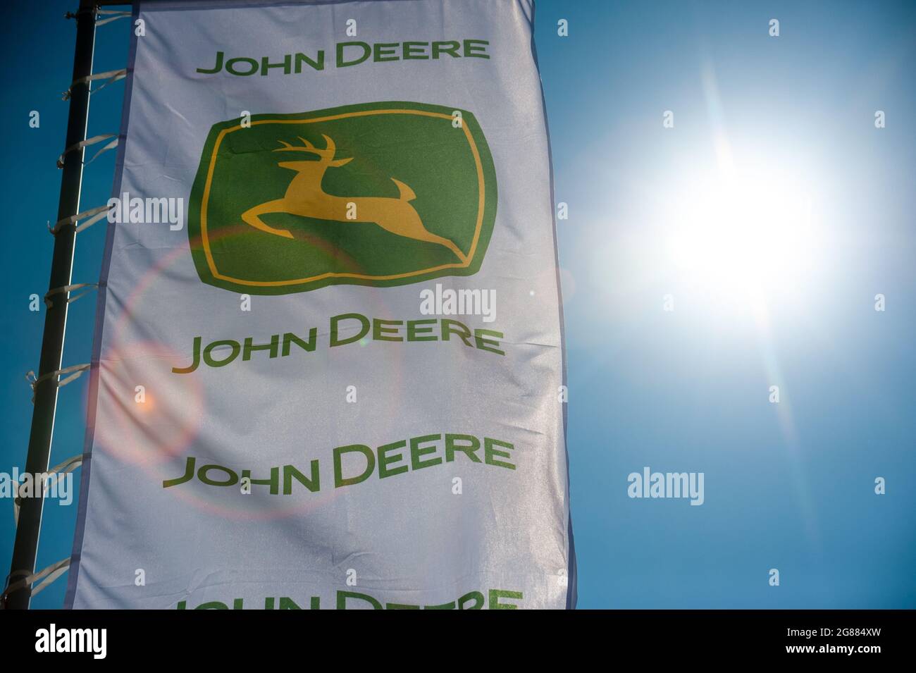 Tambov, Russia. 09th July, 2021. A view of a flag with the emblem of the manufacturer of agricultural machinery John Deere. (Photo by Lev Vlasov/SOPA Images/Sipa USA) Credit: Sipa USA/Alamy Live News Stock Photo