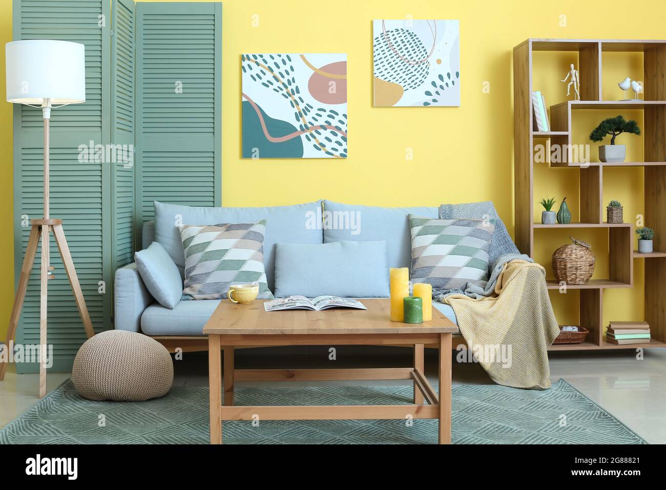Interior of stylish living room with comfortable sofa Stock Photo - Alamy