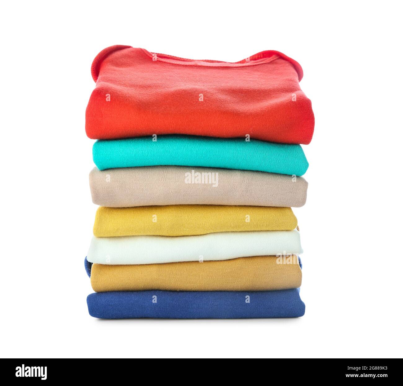 Stack of baby clothes on white background Stock Photo - Alamy