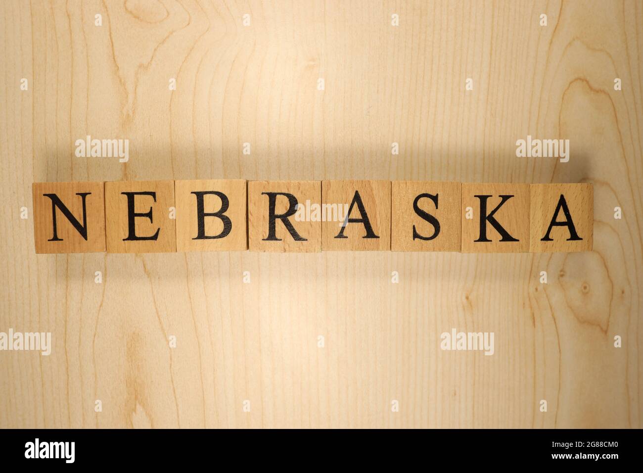 The word Nebraska was created from wooden letter cubes. Cities and