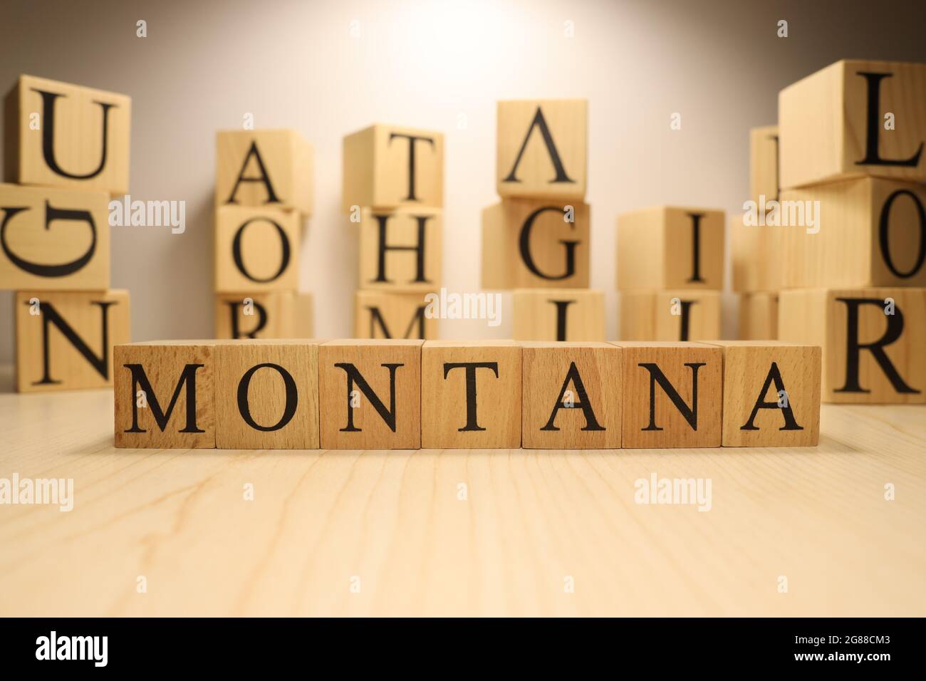 The word Montana was created from wooden letter cubes. Cities and words. close up Stock Photo