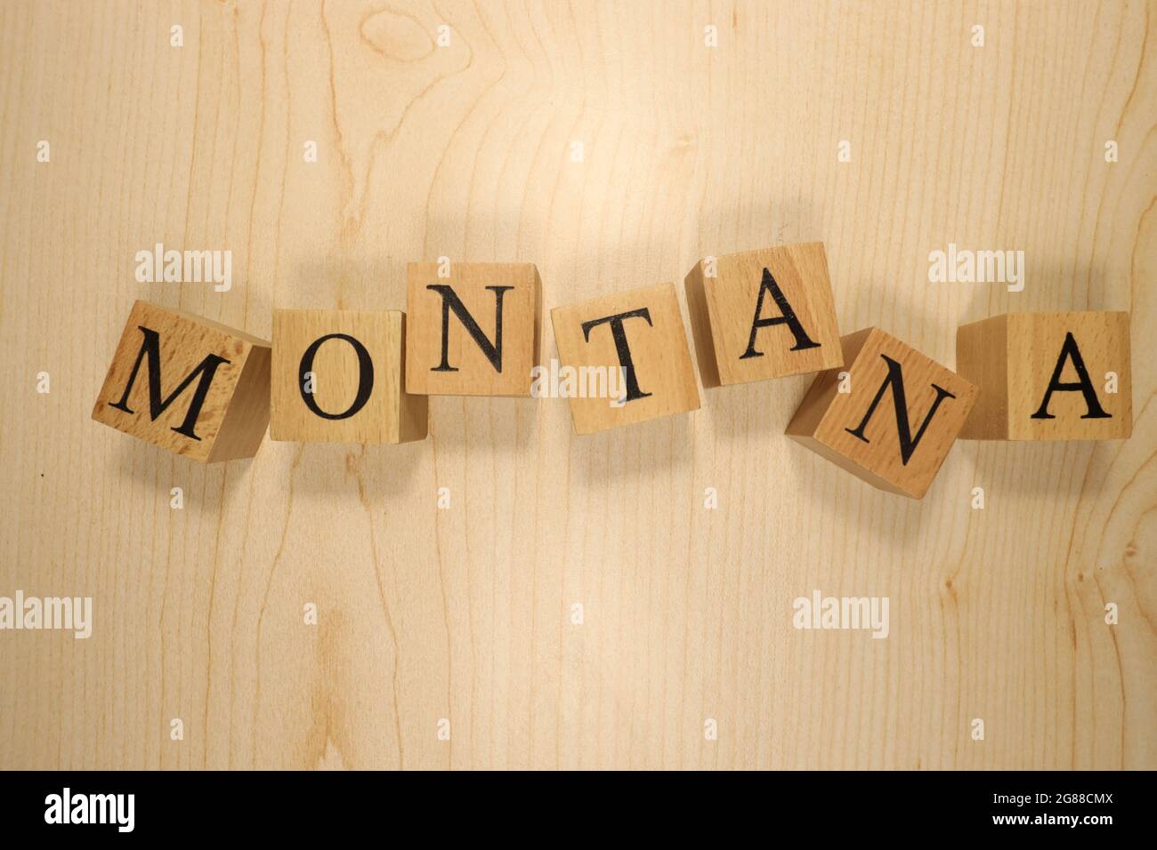 The word Montana was created from wooden letter cubes. Cities and words. close up Stock Photo