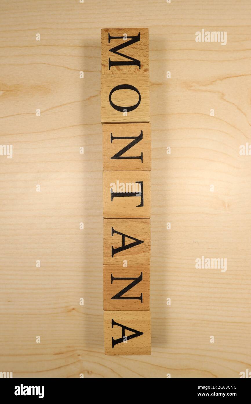 The word Montana was created from wooden letter cubes. Cities and words. close up Stock Photo