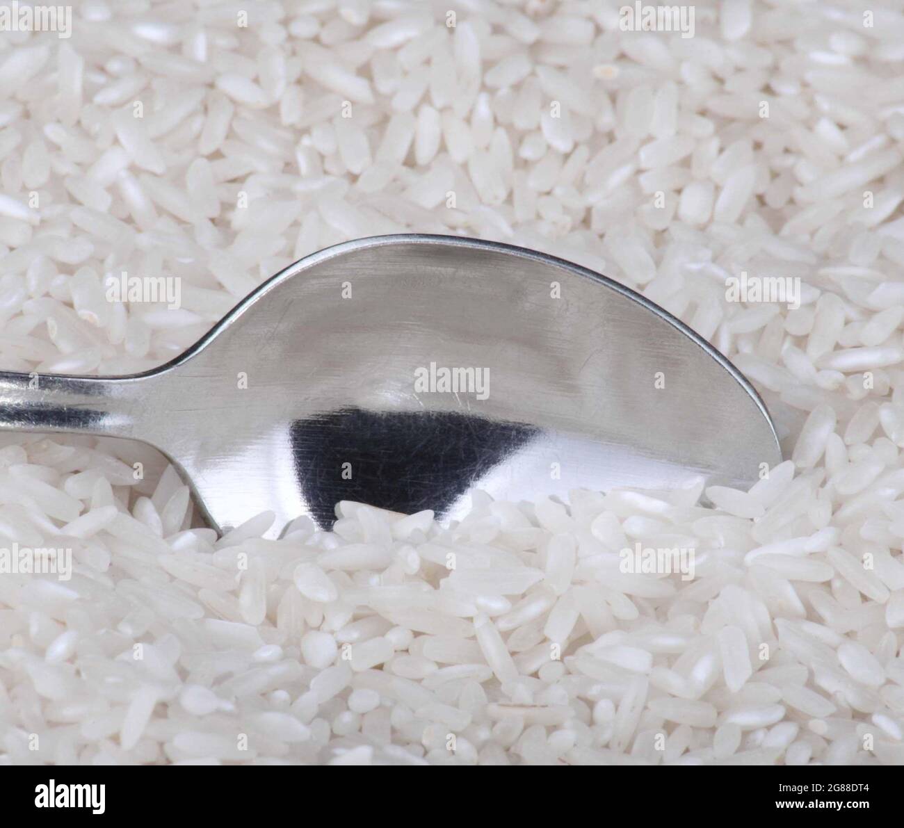 rice food background and teaspoon Stock Photo Alamy
