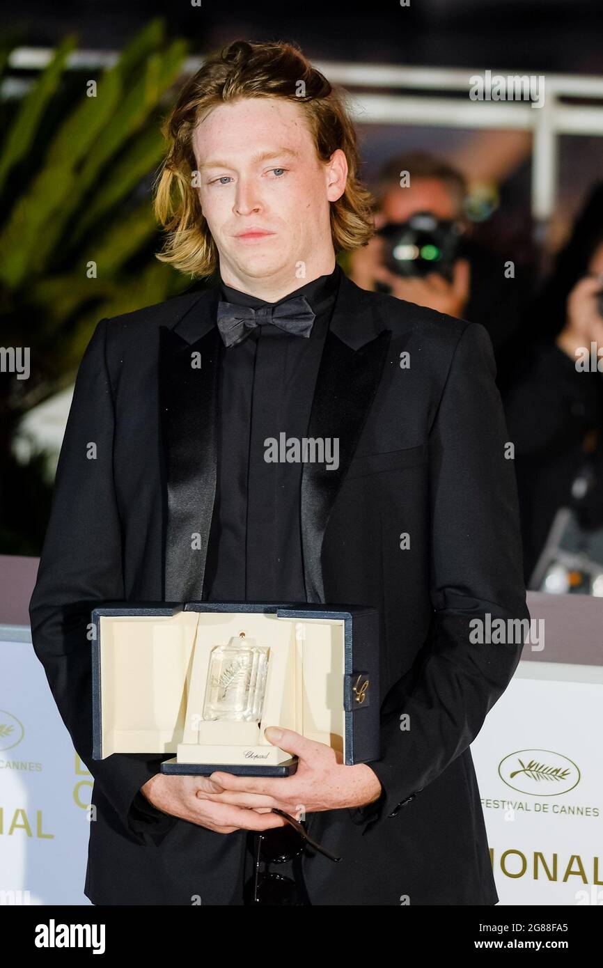 Palais des festivals, Cannes, France. 17th July, 2021. Caleb Landry Jones poses at the Awards Photocall. Caleb Landry Jones poses on with the Best Actor Prize - 'Nitram. Picture by Credit: Julie Edwards/Alamy Live News Stock Photo