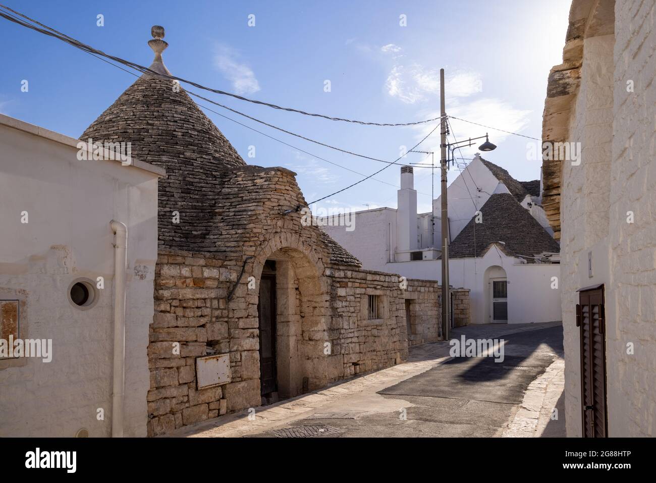 Beautiful town of Alberobello with typical trulli houses built from stone, main touristic district, Apulia region, Southern Italy, UNESCO Heritage Stock Photo