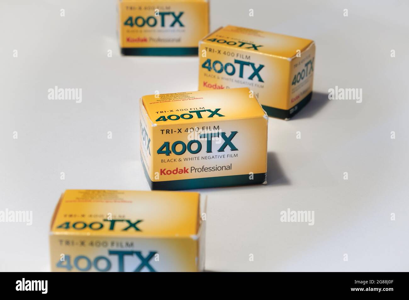 Eastman Kodak film roll boxes lined up of Tri-X 400 black and white film with smooth background Stock Photo