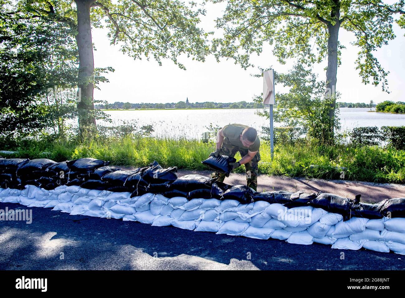 The dikes built with sandbags by defense personnel, to stopping water