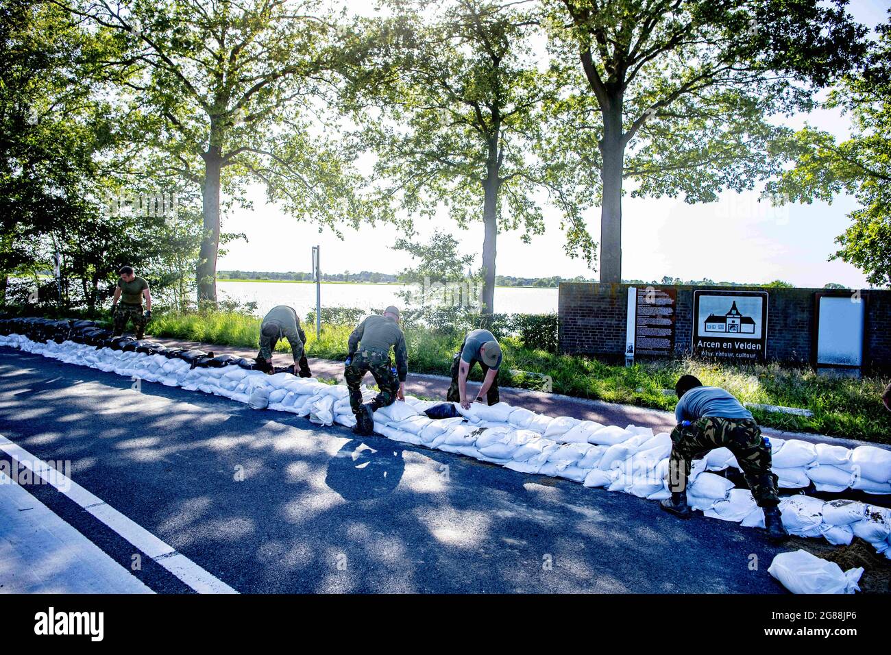 The dikes built with sandbags by defense personnel, to stopping water