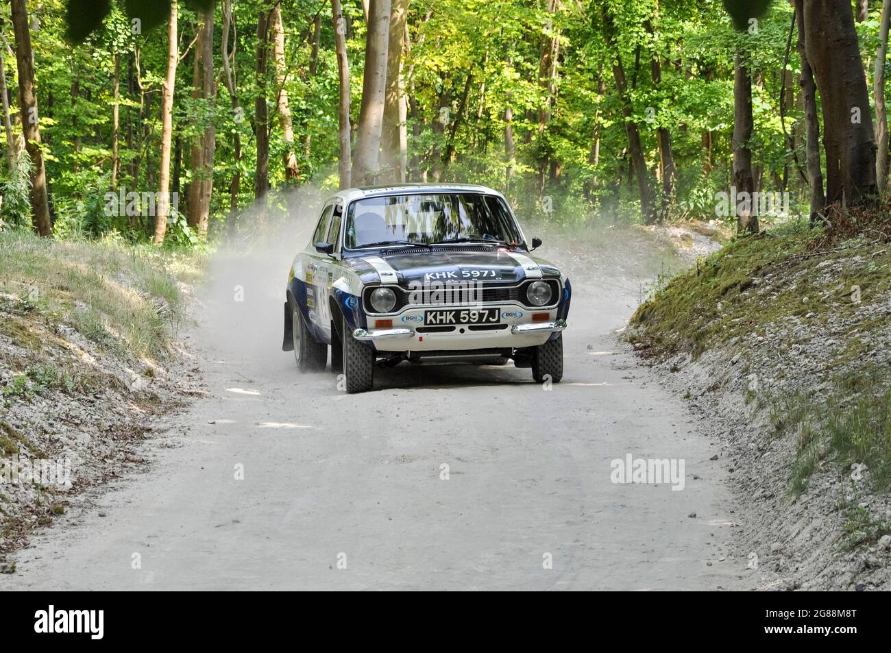Classic Ford Escort RS1600 Mk1 rally car racing on the rally stage at the Goodwood Festival of Speed 2013. Historic rallying through forest stage Stock Photo