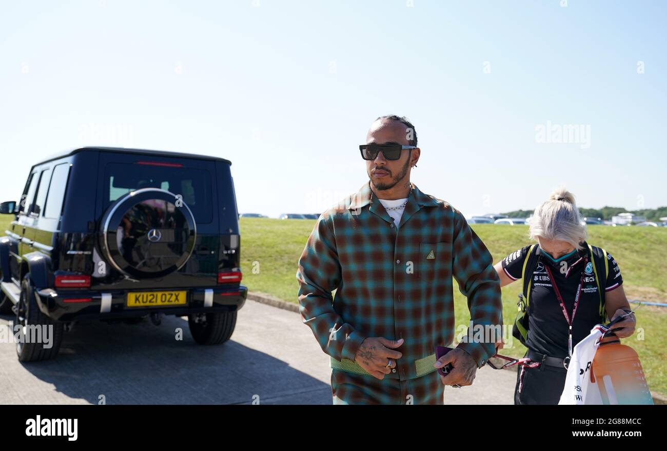 Mercedes' Lewis Hamilton and performance coach Angela Cullen arriving at the paddock before the British Grand Prix at Silverstone, Towcester. Picture Date: Sunday July 18, 2021. Stock Photo