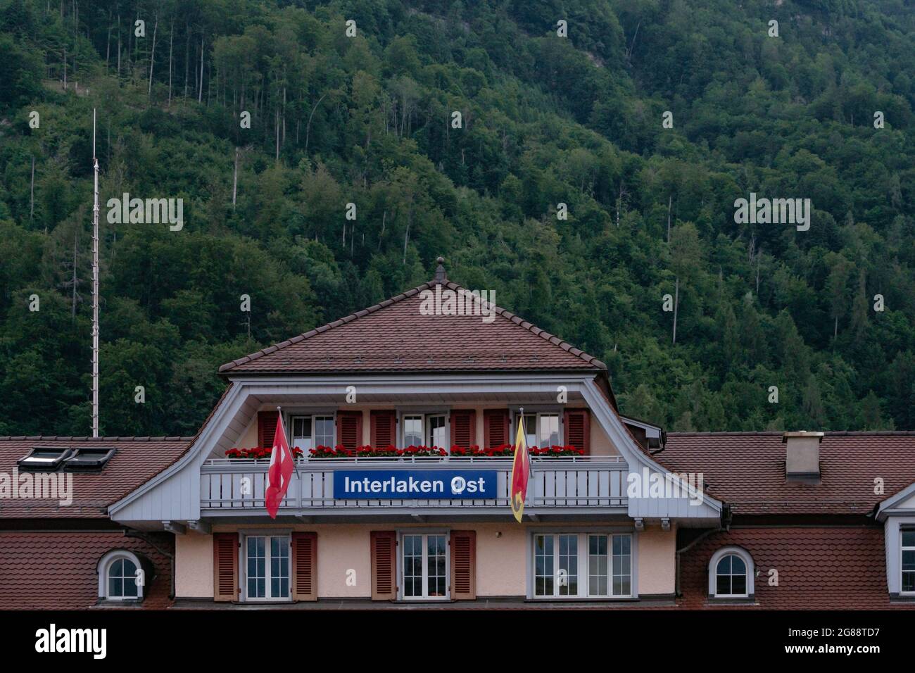 Interlaken Ost train station Building (Interlaken Zollhaus) with green