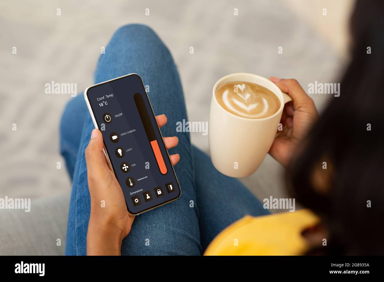 Mobile phone with smart home app, gadgets, house comfort, rest and