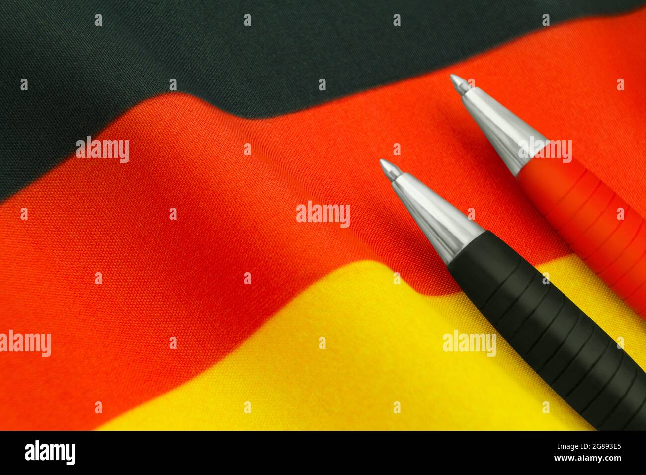 Deutsche Flagge und Kugelschreiber schwarz rot Stock Photo