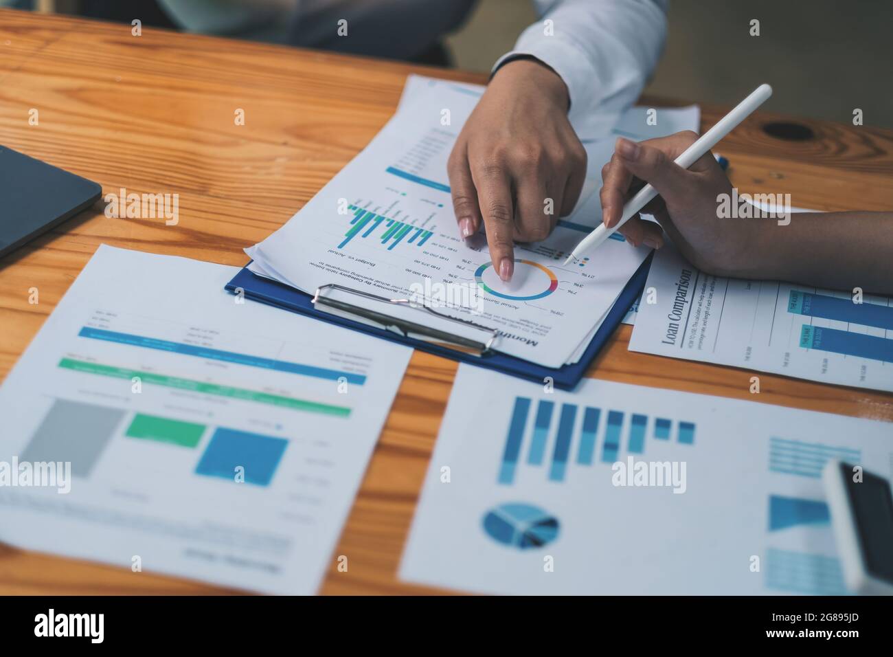 Close up hand of business people meeting to discuss the situation on the market. Business Financial Concept. Stock Photo