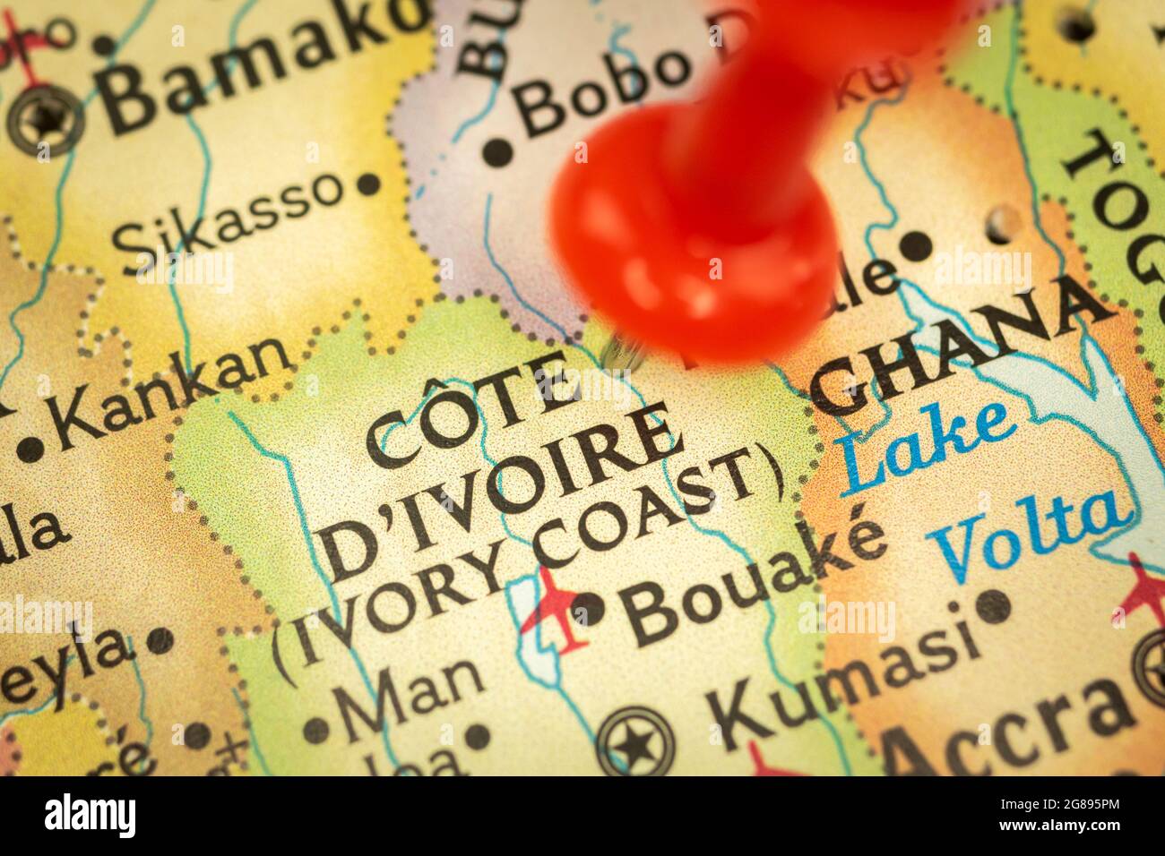 Location Ivory Coast or Cote D'ivoire, map with push pin closeup, travel and journey concept