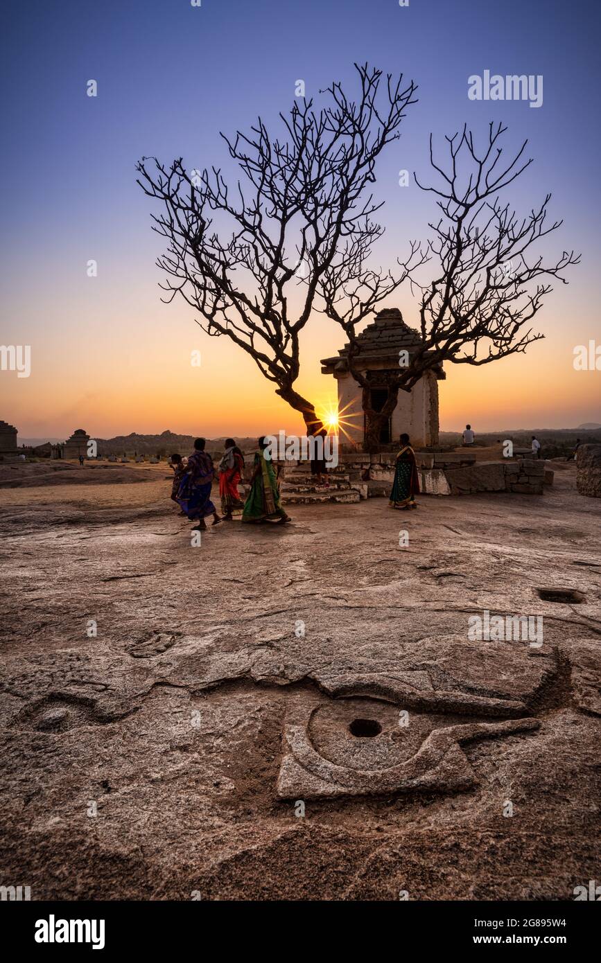 Hampi, Karnataka, India - January 14, 2020 : Beautiful ancient architecture of temples on Hemakuta Hill in Hampi from 14th Century Vijayanagara Kingdo Stock Photo