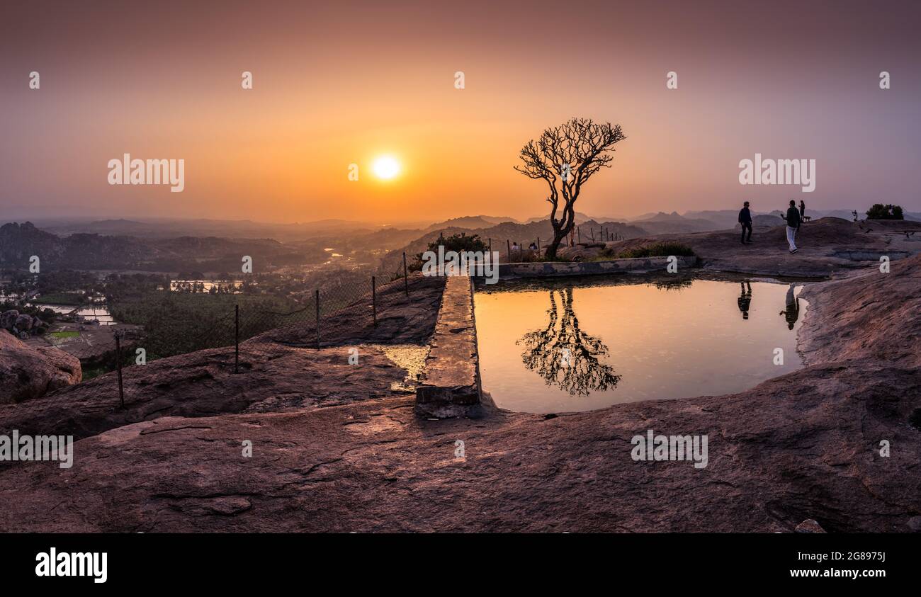 Hampi, Karnataka, India - January 15, 2020 : Sunset view of Kishkinda, Anjanadri Hill, (Monkey Temple) Anjaneya Parvat, the birthplace of Hanuman God, Stock Photo