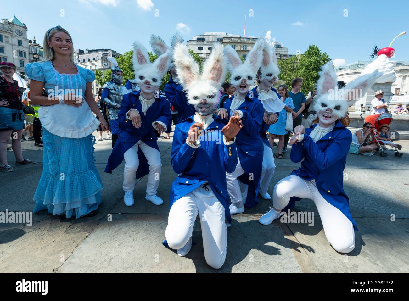 London, UK. 18 July 2021. Actors dressed as Alice (as the white queen ...