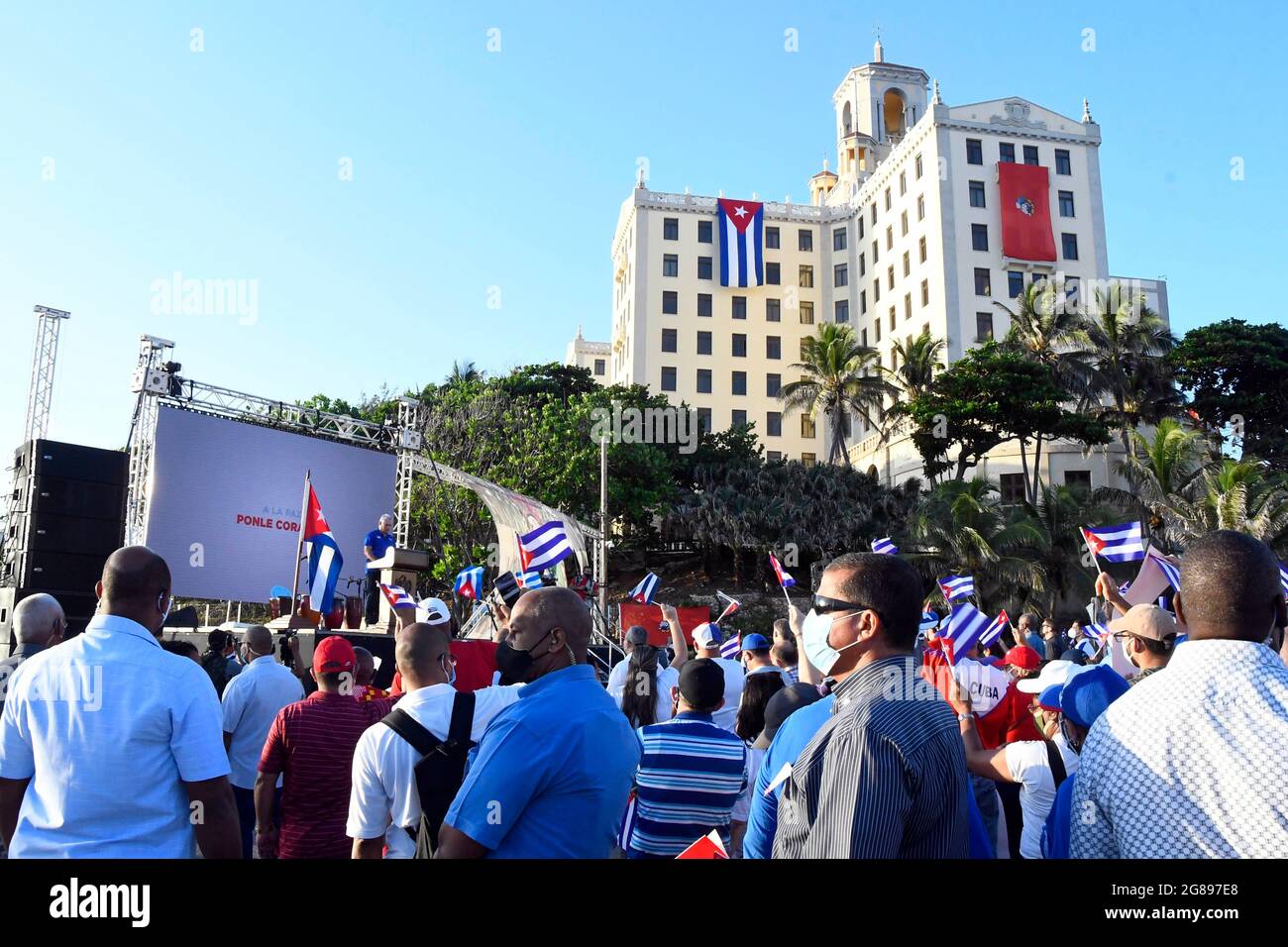 Havana, Cuba. 17th July, 2021. People attend a political gathering in Havana, Cuba, July 17, 2021. Thousands of Cubans on Saturday gathered at the La Piragua esplanade in Havana to express their support of the island's government after the recent unrest. Raul Castro, leader of the Cuban socialist revolution, President Miguel Diaz-Canel, high-ranking officials, and leaders of social organizations attended the event. Credit: Joaquin Hernandez/Xinhua/Alamy Live News Stock Photo